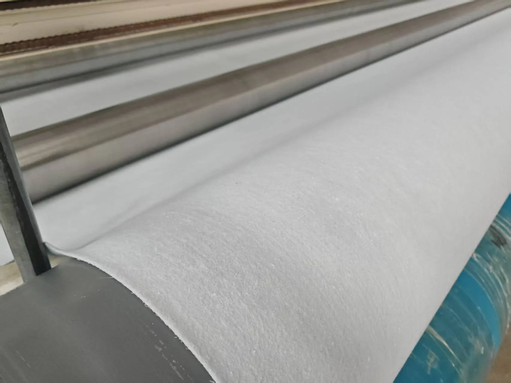 Needle-punched geotextile fabric coming off the roller.