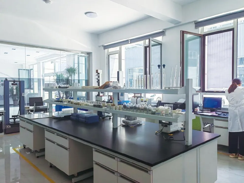 Laboratory benches with testing equipment for sheet and compound.